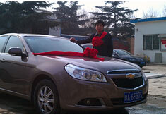 超前涂料獎勵員工轎車，真石漆生產(chǎn)廠家！